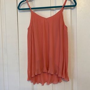 Pink sleeveless ruffle high-low blouse